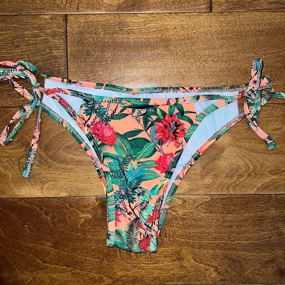Express cut out, jungle print swimsuit bikini bottoms, size medium​​​​​​​